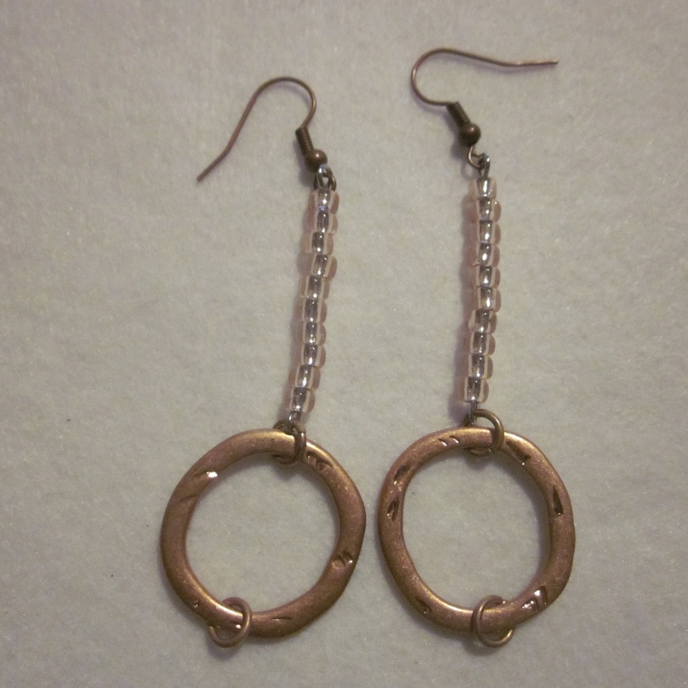 NWOT.  Rose Gold Earring